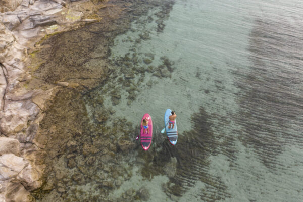 2 SUPs in blue water